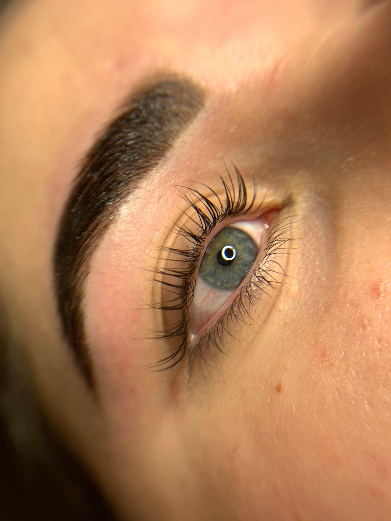 Close-up of lifted, tinted natural lashes by Flawless Skye Beauty Bar